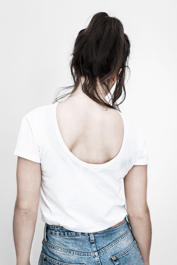 Back of low cut t-shirt with label visible in transparency
